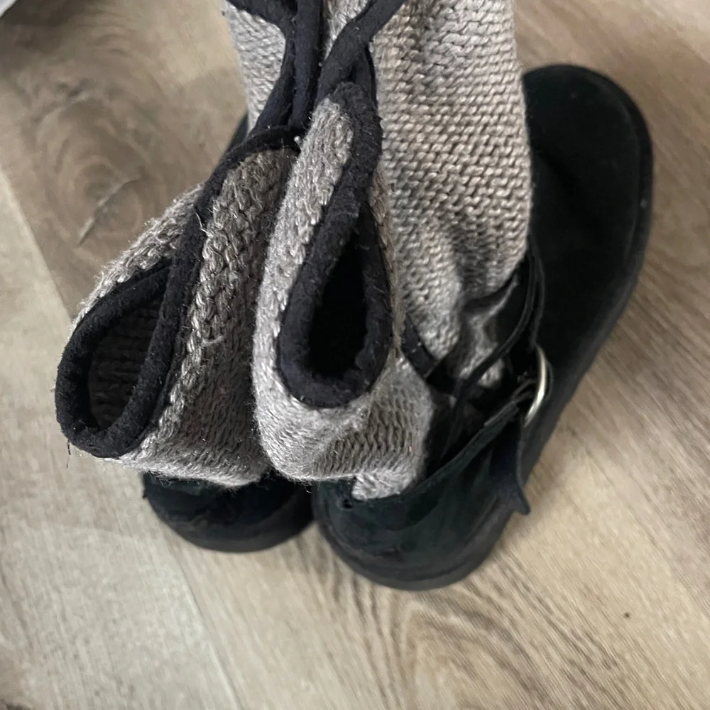 UGG Australia Nyla boots in black suede with a gray knit shaft and buckle strap